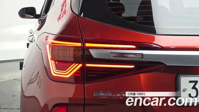 Kia Seltos 2019 — ფოტო 7/30