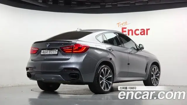 BMW X6 2018 — Фото 2/20