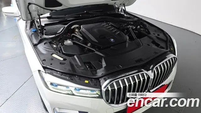 BMW 7 Series 2021 — Фото 6/20
