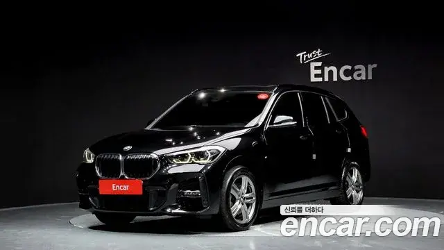 BMW X1 2021 — Фото 1/20