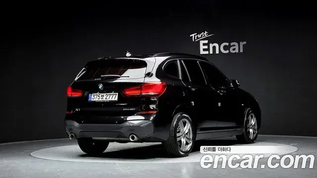 BMW X1 2021 — Фото 2/20