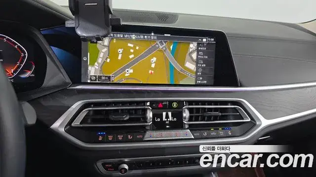 BMW X7 2022 — ფოტო 15/20