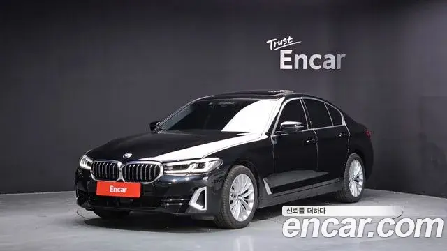 BMW 5 Series 2023 — ფოტო 11/35