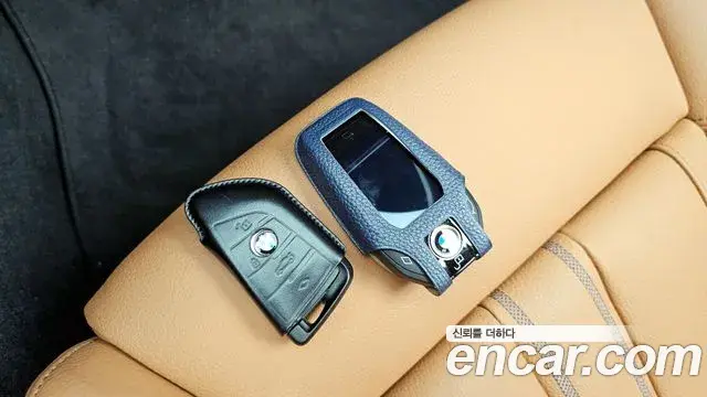 BMW 5 Series 2023 — ფოტო 24/35