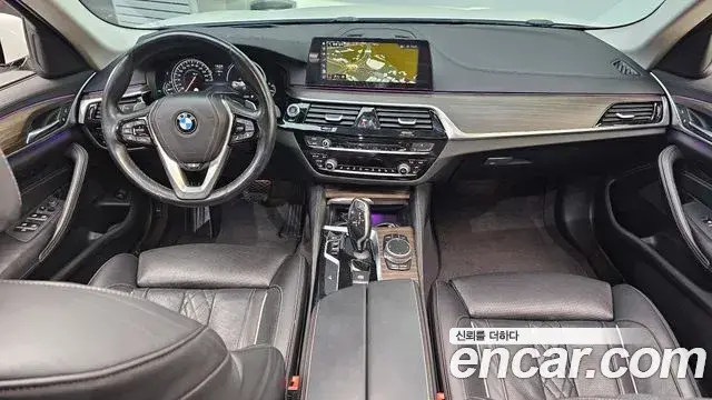 BMW 5 Series 2018 — Фото 7/20