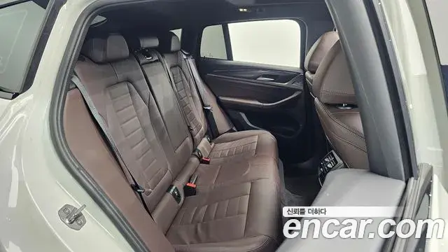 BMW X4 2022 — ფოტო 11/34