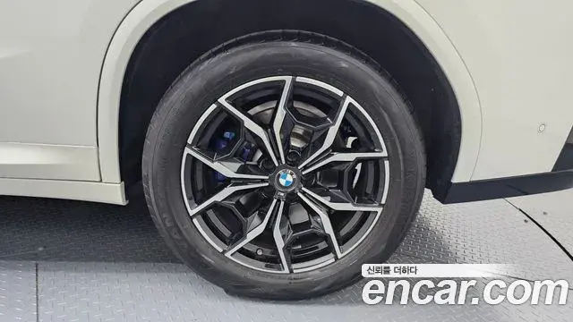 BMW X4 2022 — ფოტო 6/34