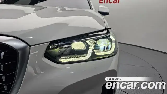 BMW X4 2022 — ფოტო 23/34