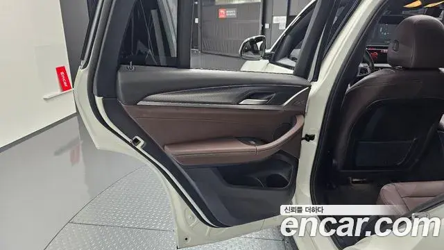 BMW X4 2022 — ფოტო 14/34