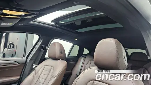 BMW X4 2022 — ფოტო 15/34