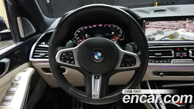 BMW X7 2021 — ფოტო 29/33