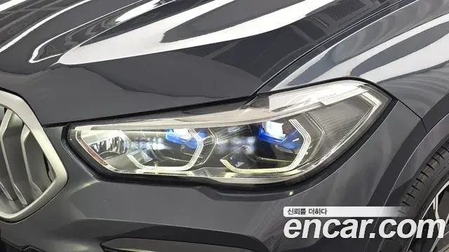 BMW X6 2022 — ფოტო 14/34