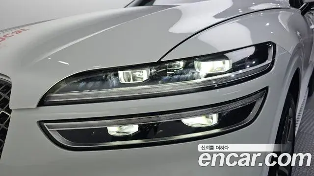 Genesis GV70 2021 — ფოტო 22/30