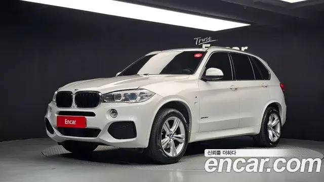 BMW X5 2018 — Фото 1/20