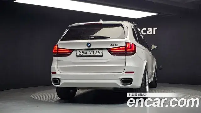 BMW X5 2018 — Фото 4/20