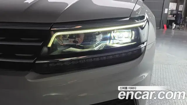 Volkswagen Tiguan 2019 — ფოტო 3/38