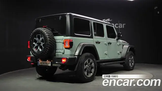Jeep Wrangler 2023 — Фото 2/20
