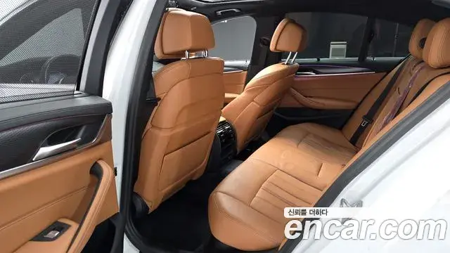 BMW 5 Series 2023 — Фото 11/20