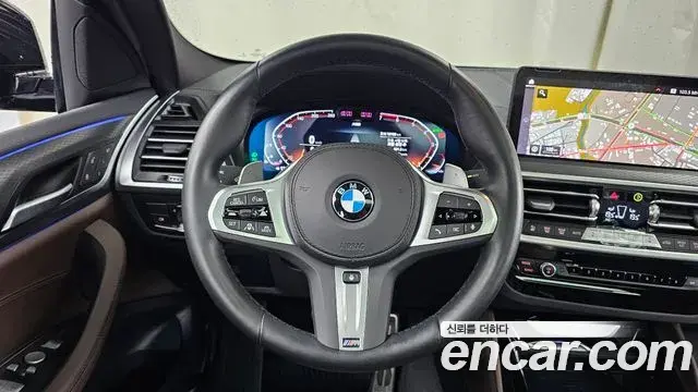 BMW X4 2024 — Фото 12/20