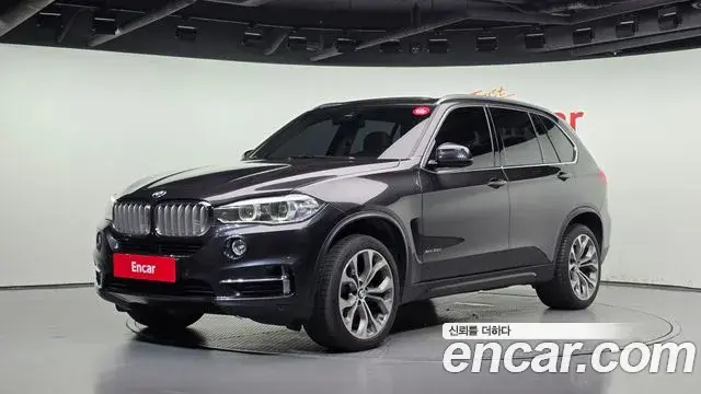 BMW X5 2018 — Фото 1/20
