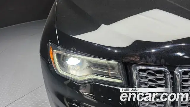 Jeep Grand Cherokee 2021 — ფოტო 18/34