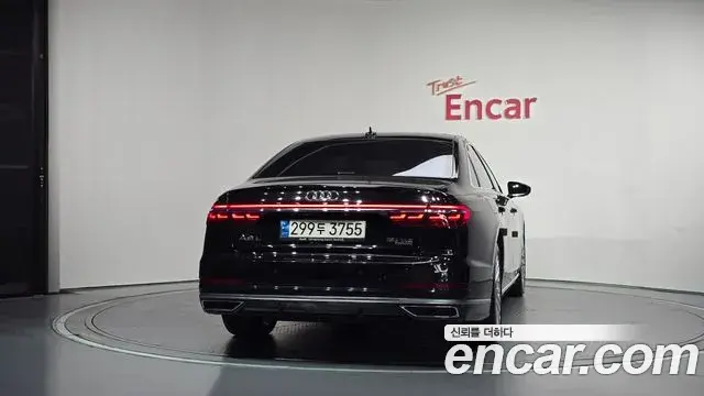 Audi A8 2021 — Фото 4/20