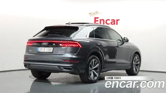 Audi Q7 2021 — Фото 2/20