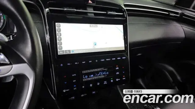 Hyundai Tucson Hybrid 2022 — ფოტო 2/33