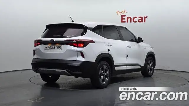 Kia Seltos 2021 — ფოტო 2/32