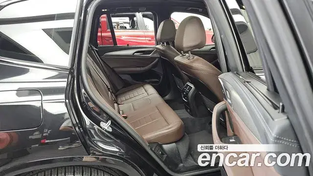 BMW X3 2021 — ფოტო 15/31
