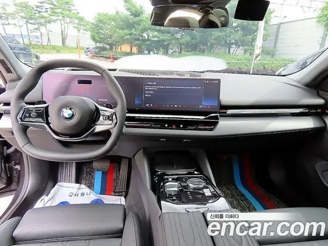 BMW 5 Series 2024 — Фото 10/20