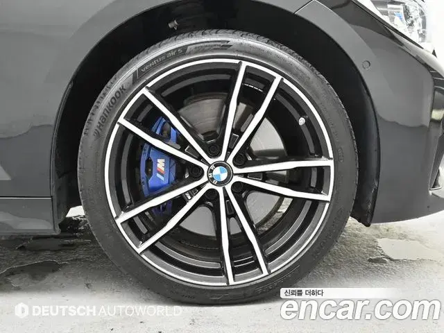 BMW 3 Series 2021 — ფოტო 18/20