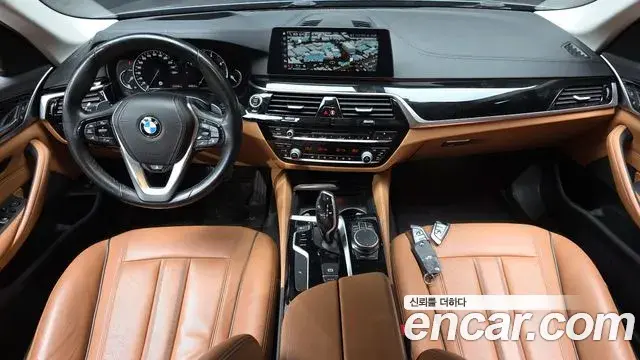 BMW 5 Series 2018 — Фото 7/20