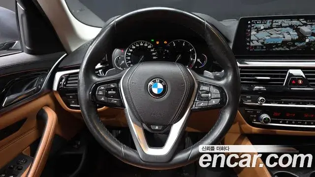 BMW 5 Series 2018 — Фото 13/20