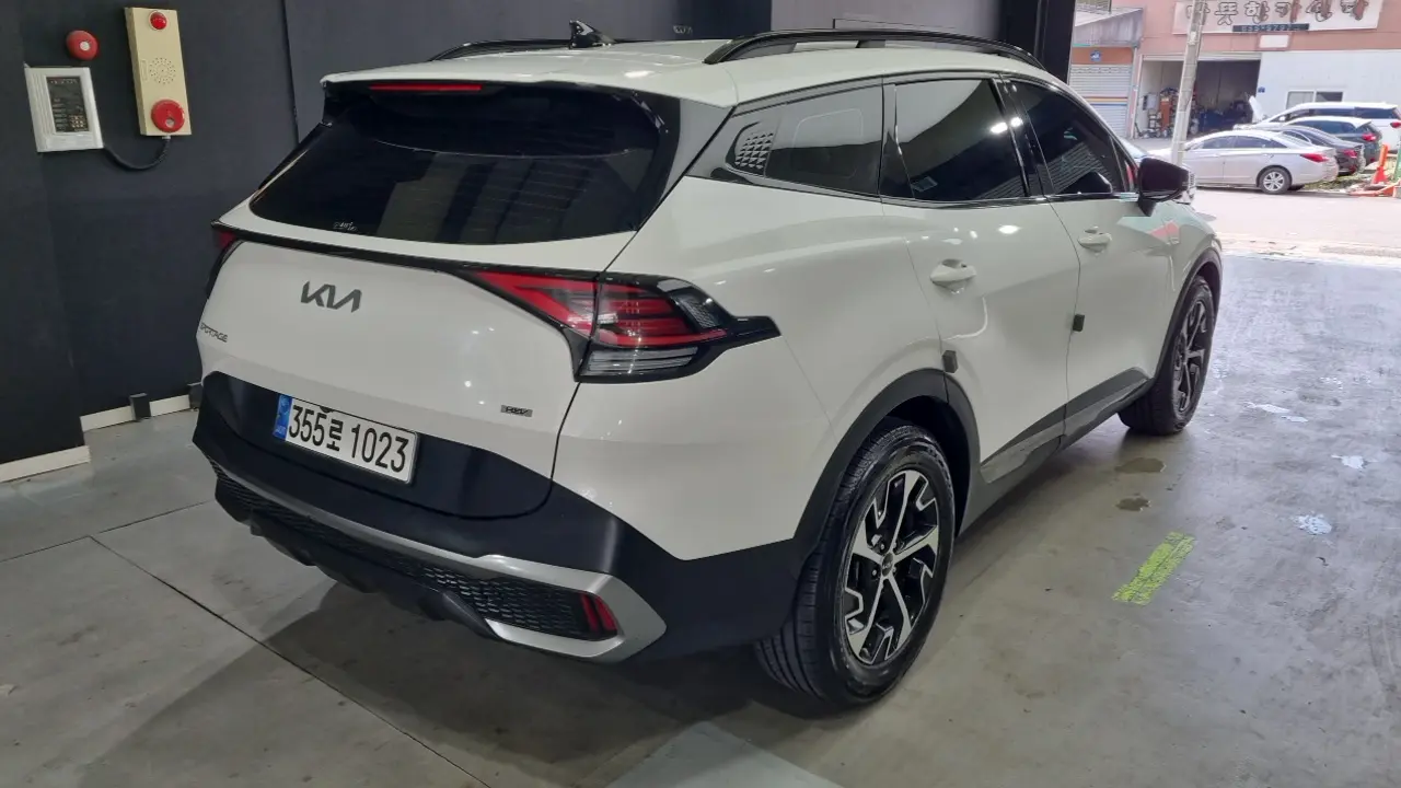 Kia Sportage 2022 — Фото 1/18