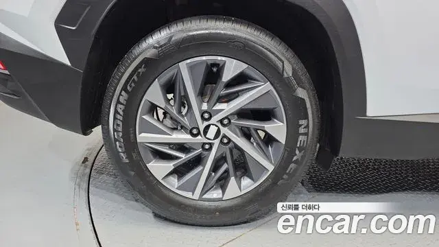 Hyundai Tucson Hybrid 2023 — ფოტო 10/30