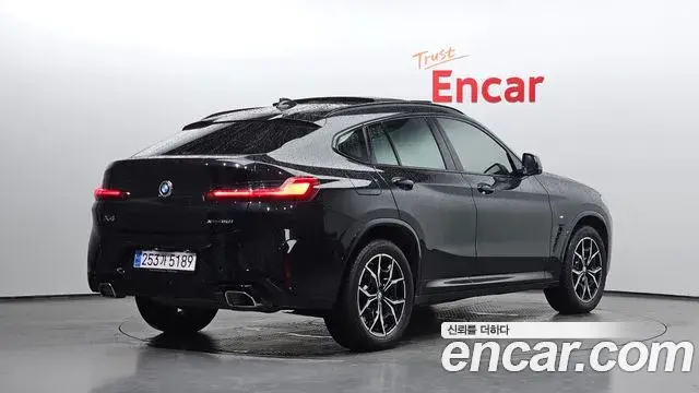 BMW X4 2023 — Фото 2/20