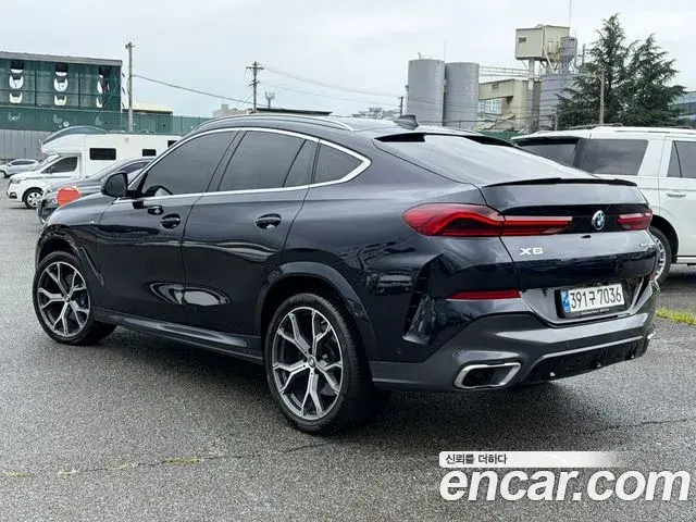 BMW X6 2021 — Фото 1/20