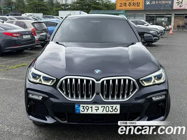 BMW X6 2021 — Фото 2/20