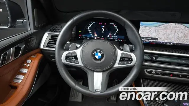 BMW X7 2024 — Фото 12/20