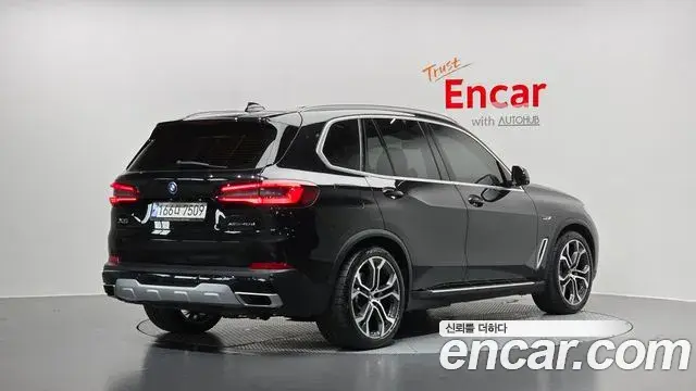 BMW X5 2022 — Фото 2/20