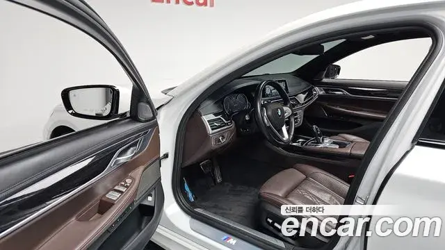 BMW 7 Series 2018 — Фото 10/20