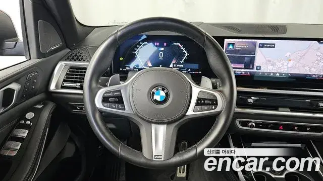 BMW X7 2024 — Фото 12/20