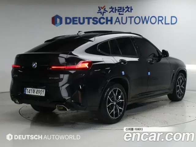 BMW X4 2022 — Фото 1/20