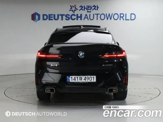 BMW X4 2022 — Фото 3/20
