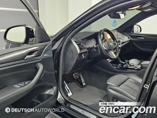 BMW X4 2022 — Фото 11/20