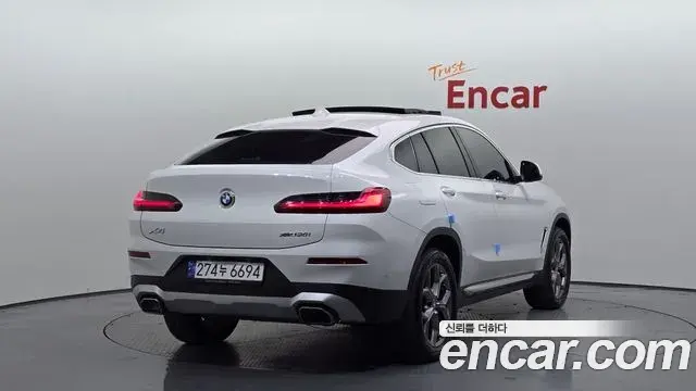 BMW X4 2023 — Фото 2/20