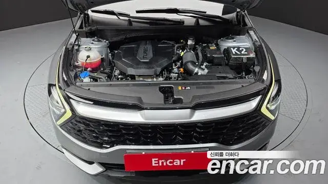 Kia Sportage 2021 — ფოტო 7/20