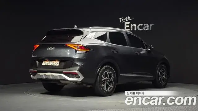 Kia Sportage 2021 — ფოტო 19/20