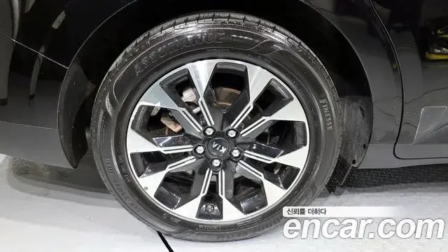 Kia Carnival 2021 — ფოტო 11/31
